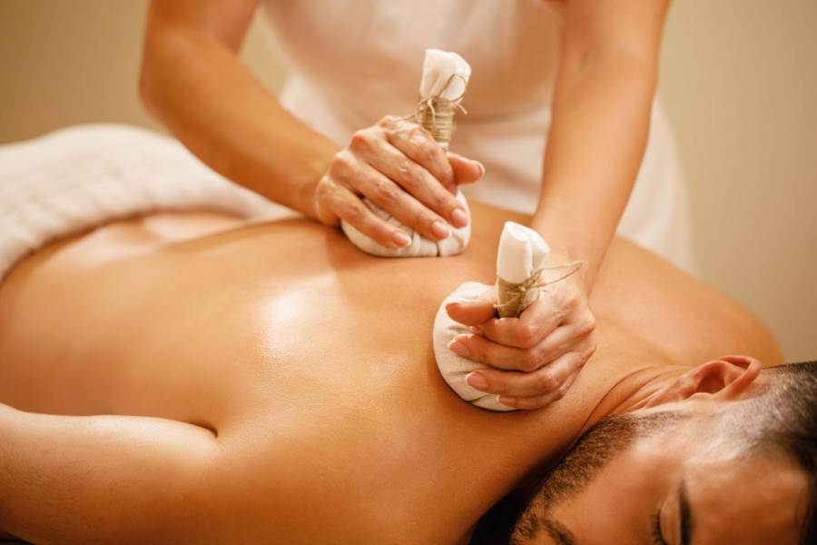 Essential oil blend selection for an aromatherapy massage session at Infinity Beauty & Spa